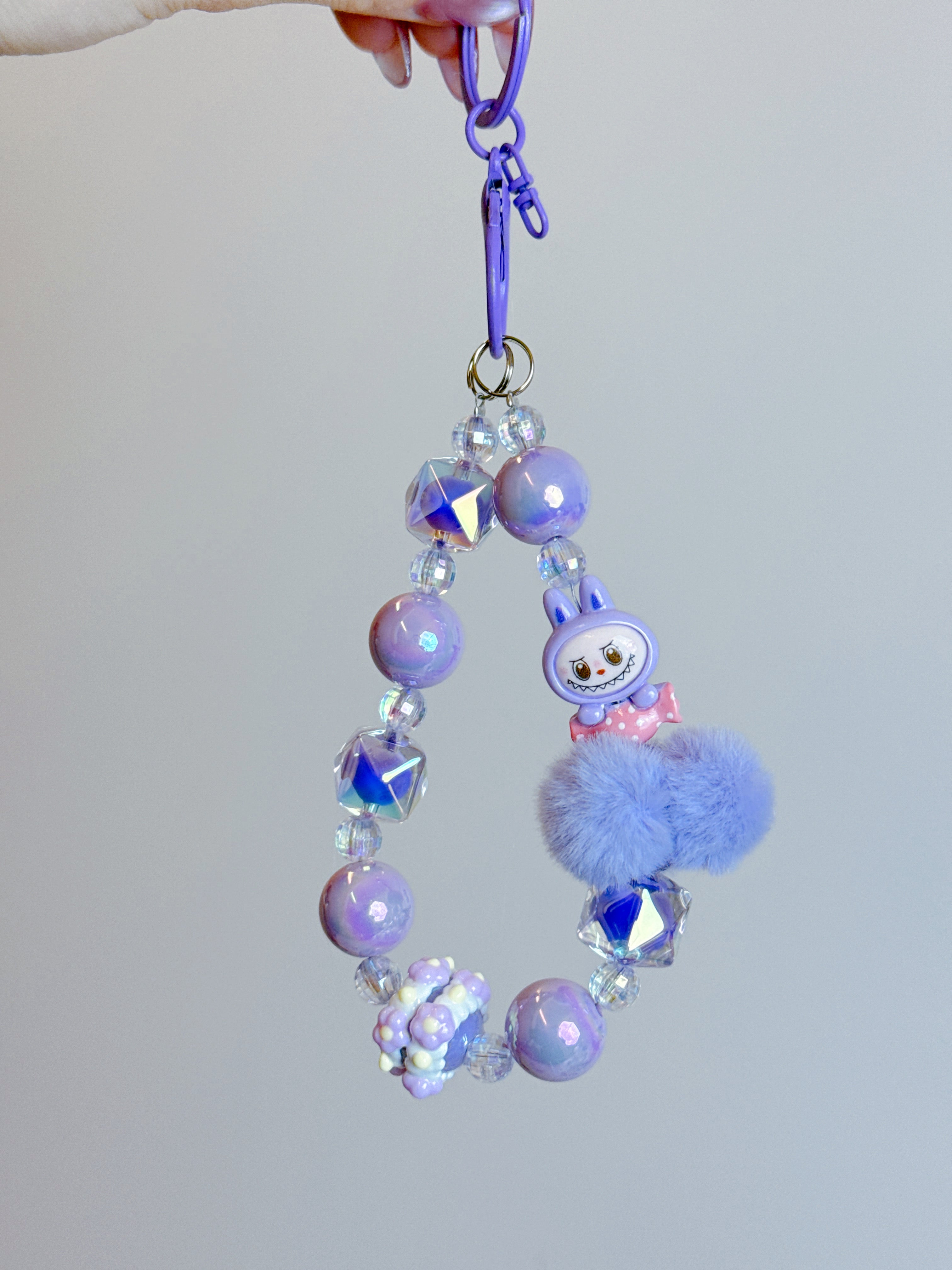 Labubu Phone Chain – Beaded Wrist Strap with Fluffy Pom-Pom & Resin Mini-Doll Charm