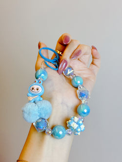 Labubu Phone Chain – Beaded Wrist Strap with Fluffy Pom-Pom & Resin Mini-Doll Charm