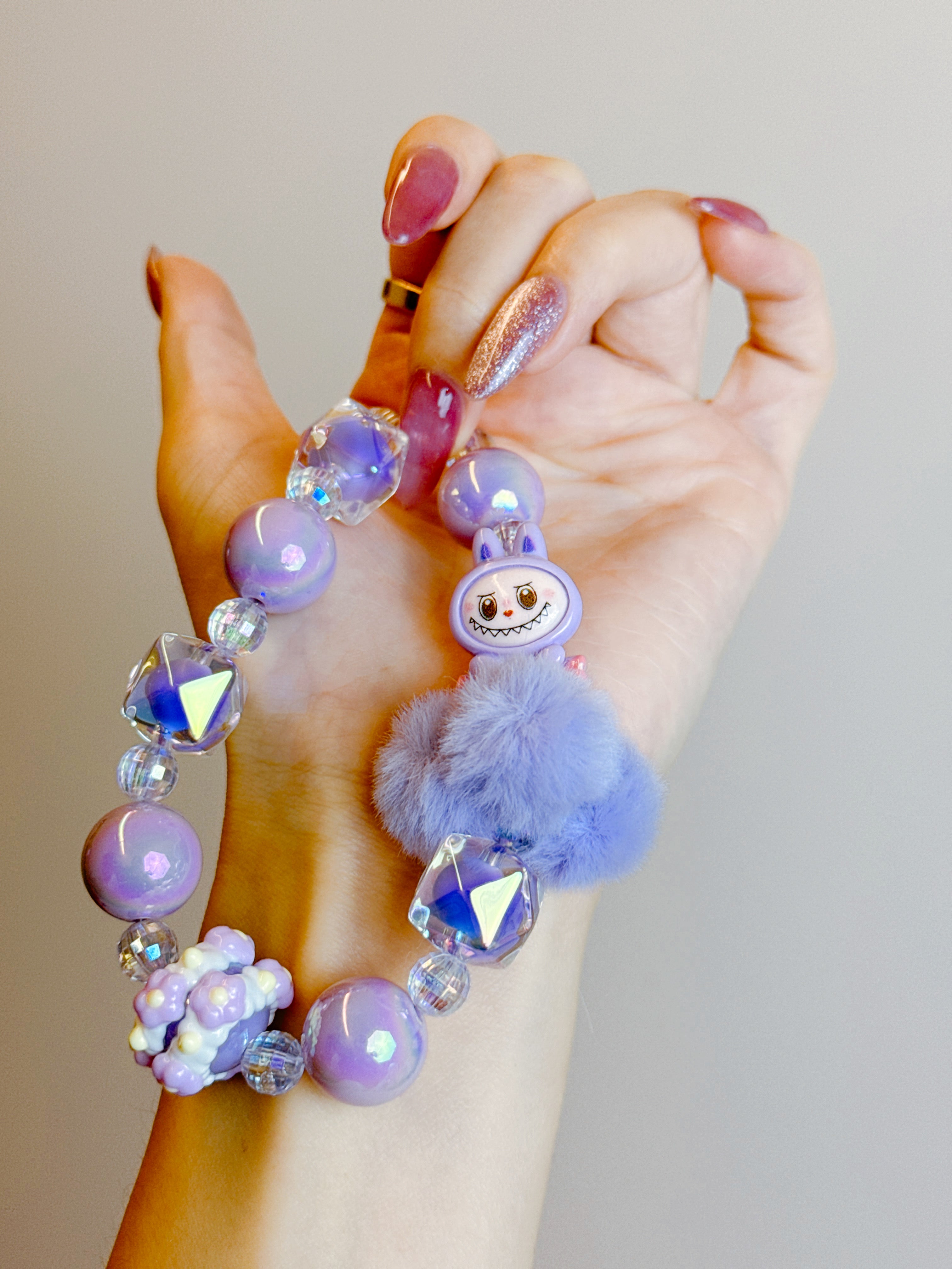 Labubu Phone Chain – Beaded Wrist Strap with Fluffy Pom-Pom & Resin Mini-Doll Charm