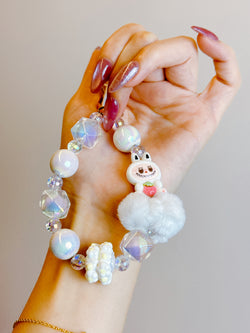 Labubu Phone Chain – Beaded Wrist Strap with Fluffy Pom-Pom & Resin Mini-Doll Charm