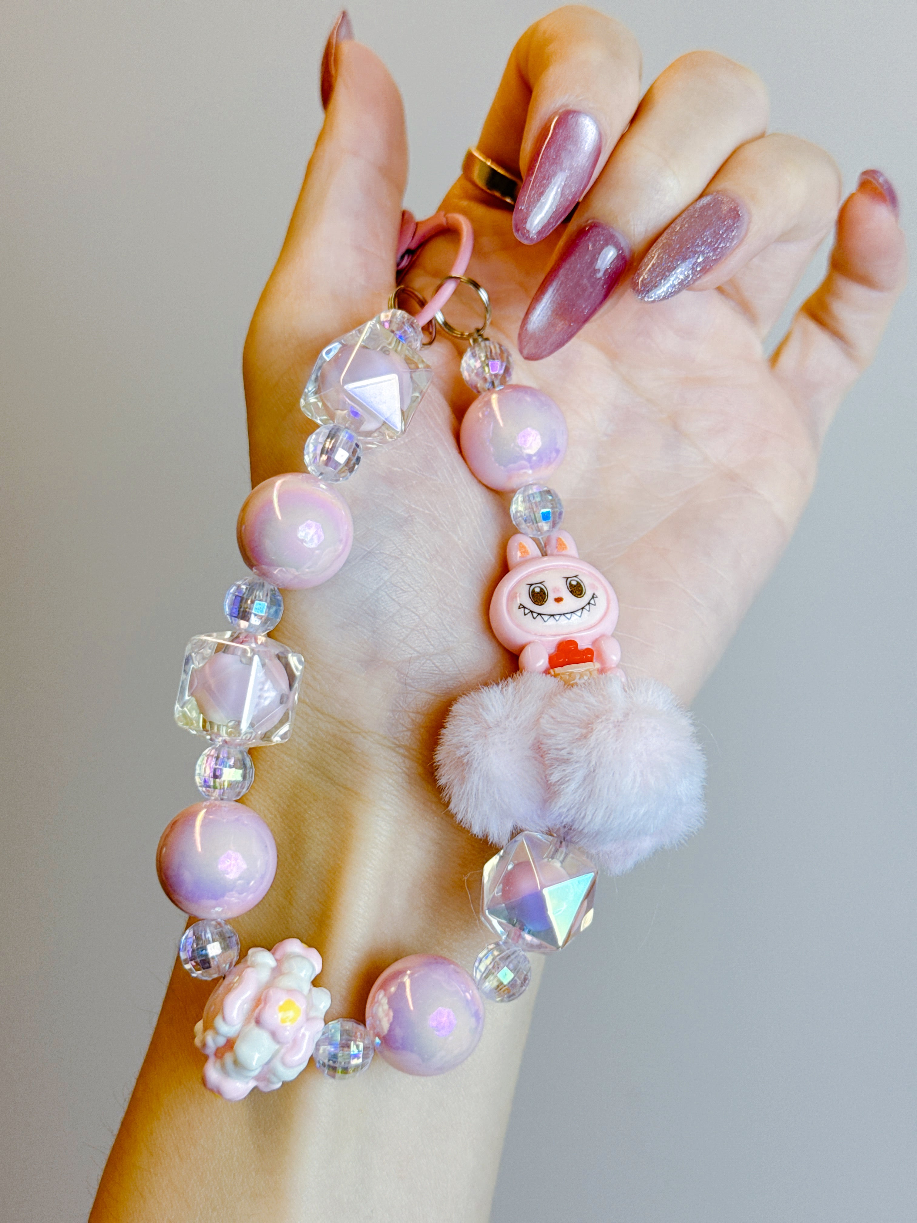 Labubu Phone Chain – Beaded Wrist Strap with Fluffy Pom-Pom & Resin Mini-Doll Charm