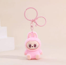 Labubu Sherling Plush Keychain – Pastel Mini Doll on Swirl Cookie Seat